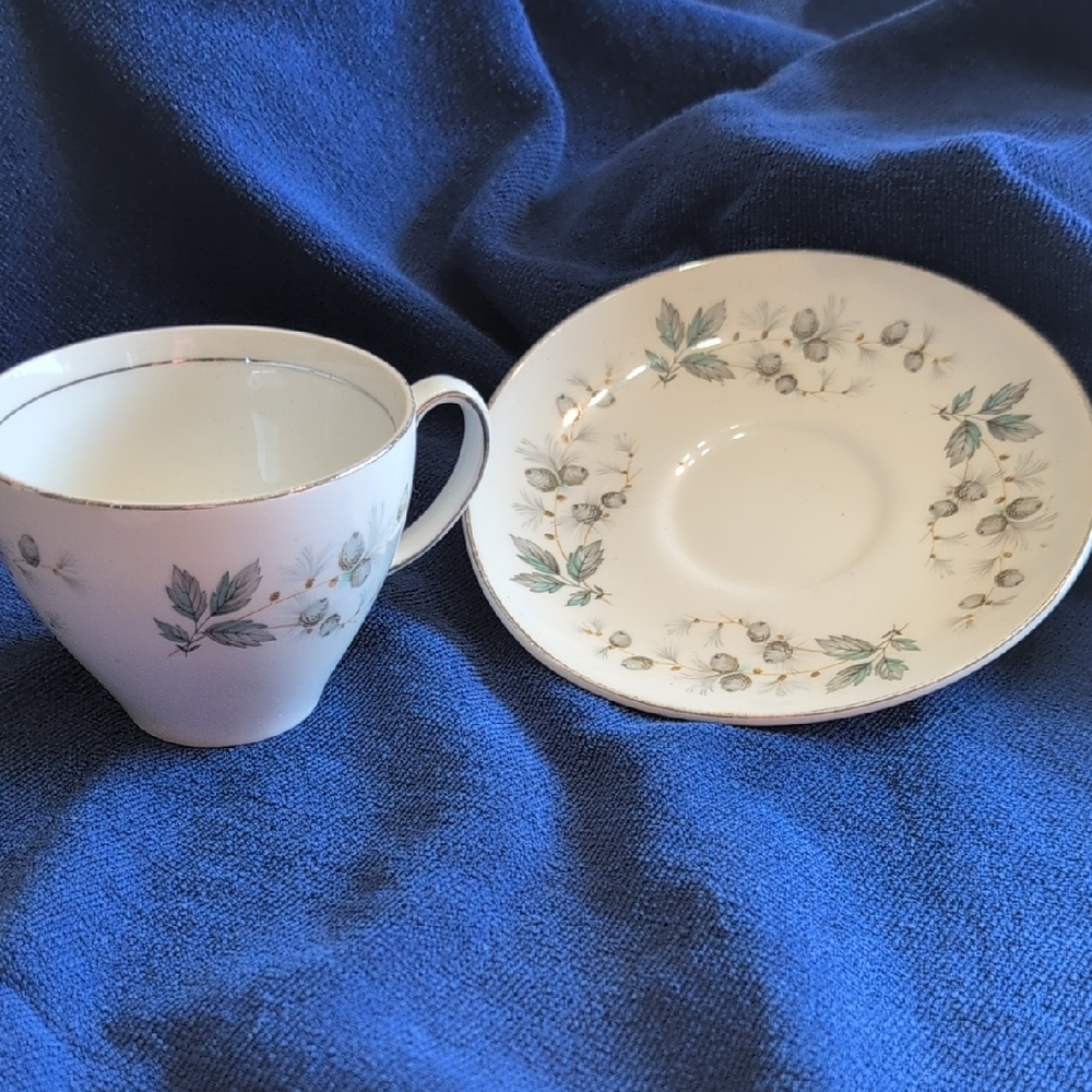 Floral White and Green Teacup and Saucer Set
